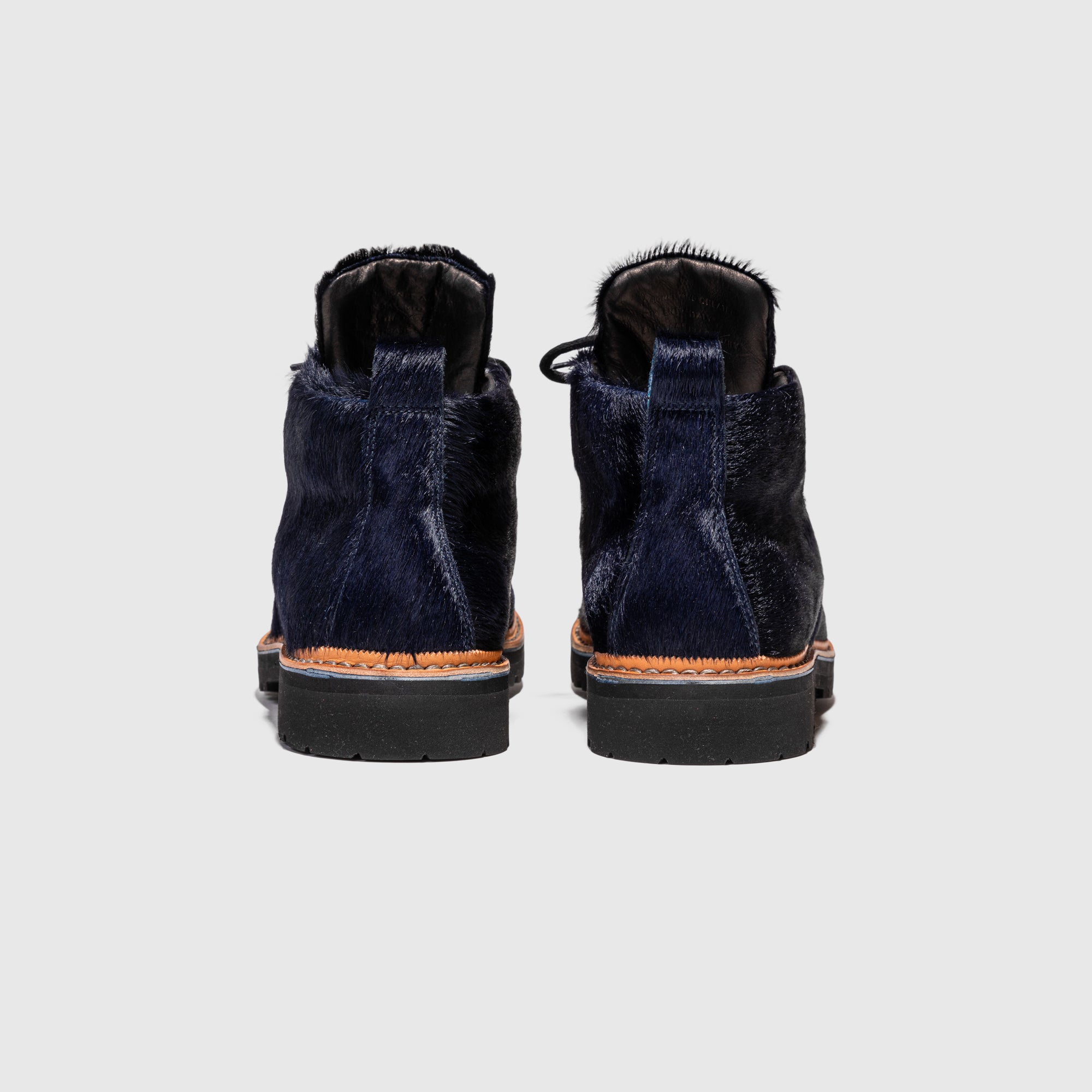 M-120 BOOT NAVY PONY HAIR X PACKER