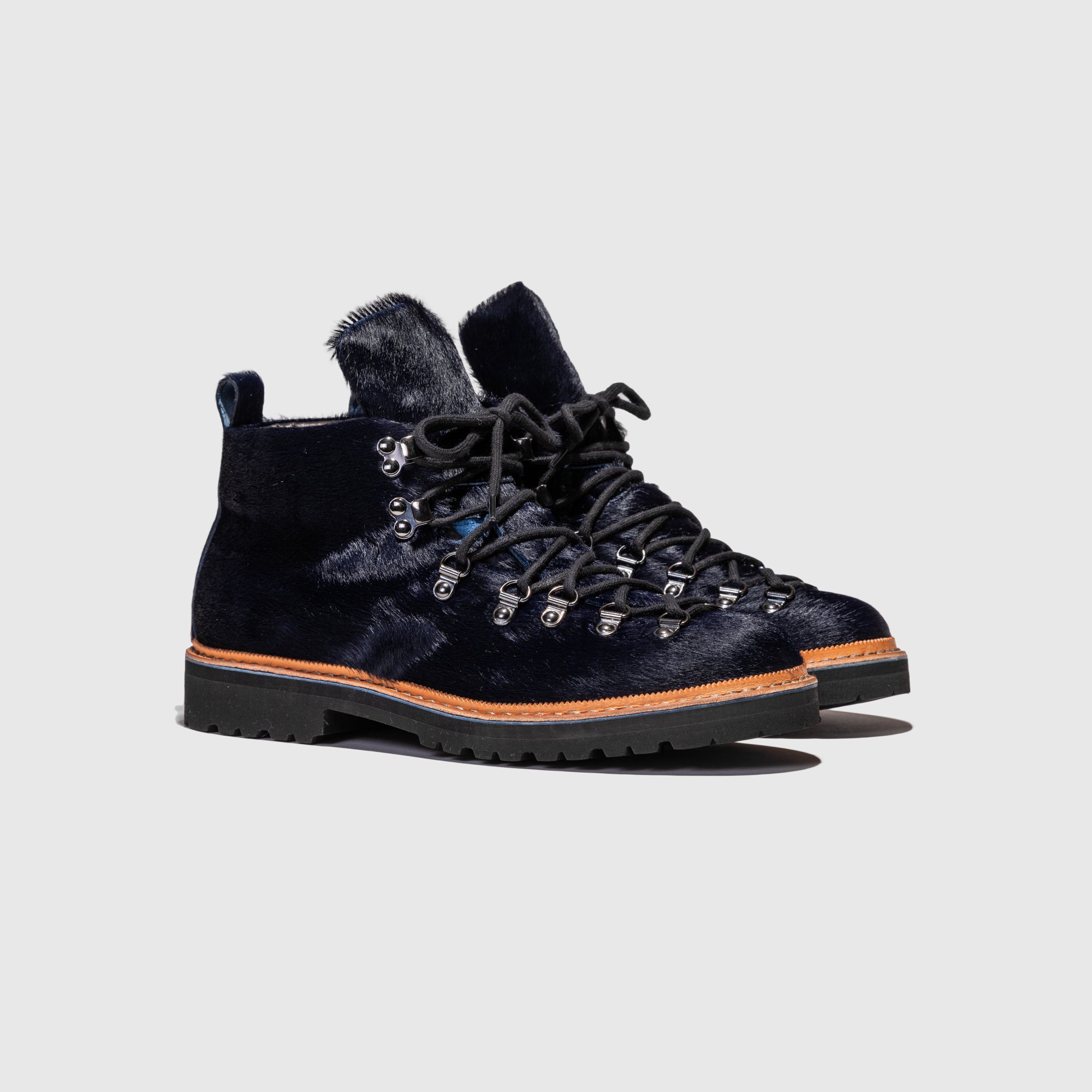 M-120 BOOT NAVY PONY HAIR X PACKER