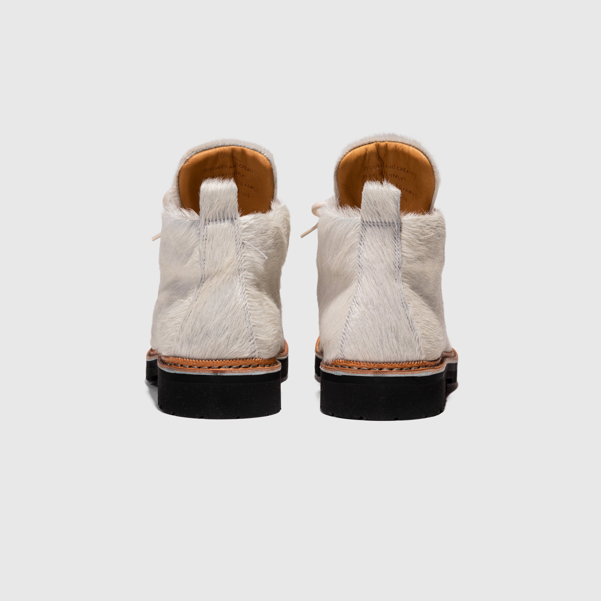 M-120 BOOT WHITE PONY HAIR X PACKER