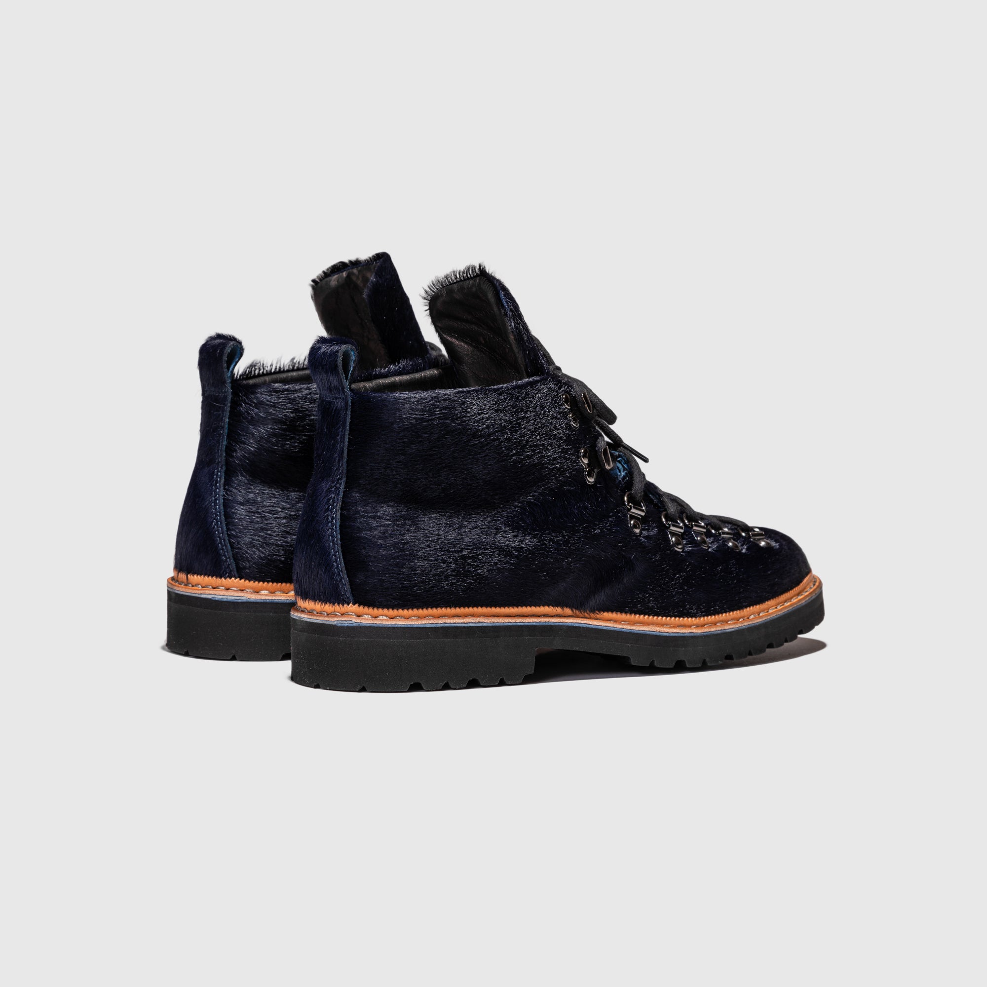 M-120 BOOT NAVY PONY HAIR X PACKER