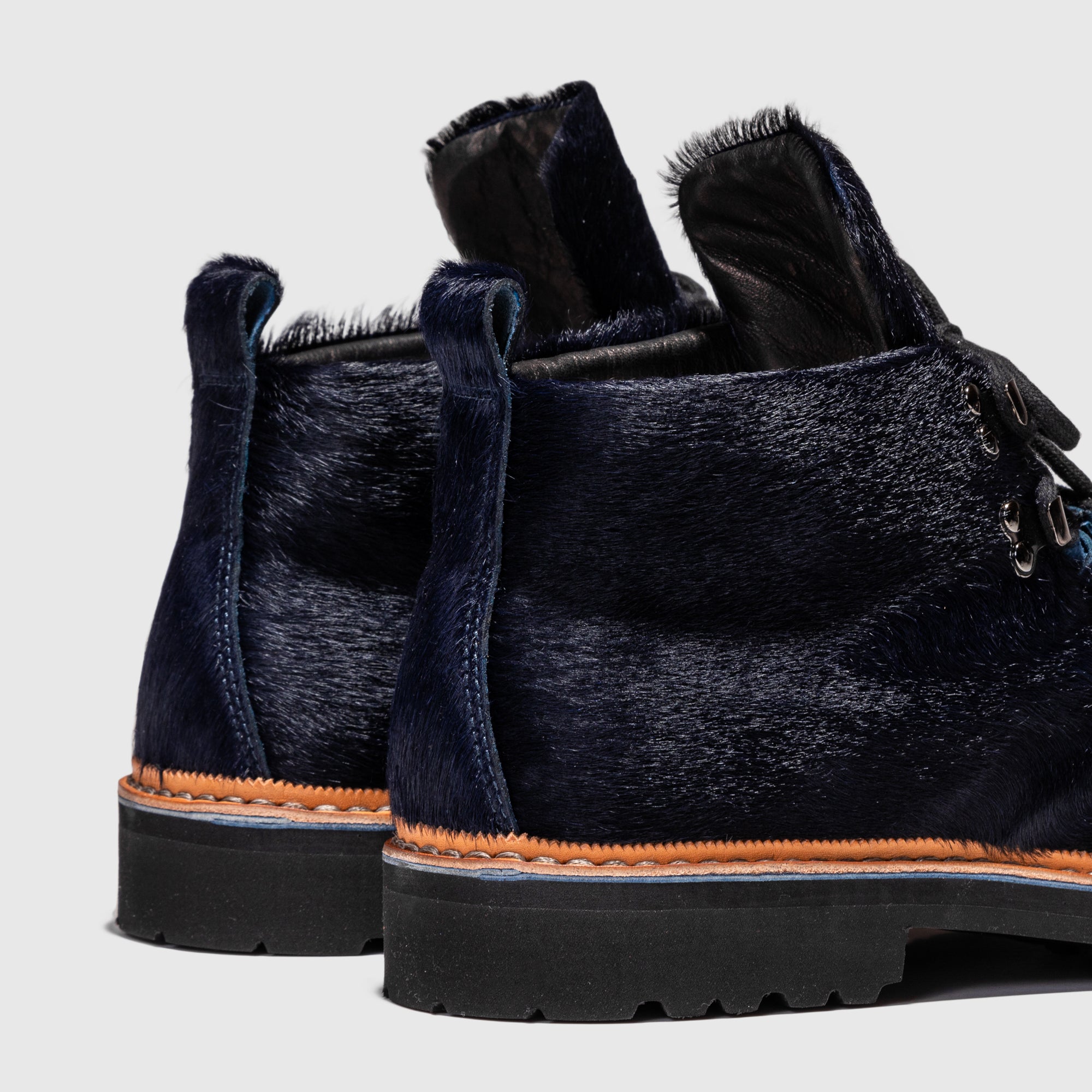 M-120 BOOT NAVY PONY HAIR X PACKER